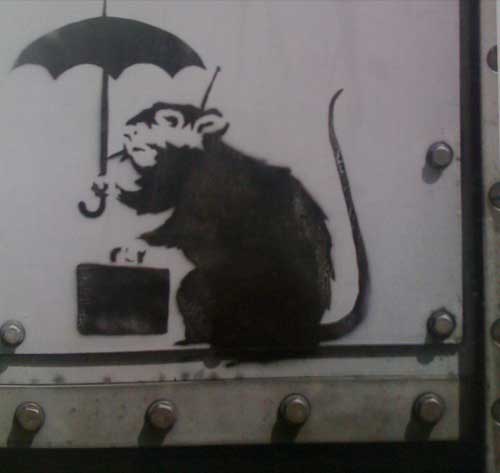 Banksy draws a rat: Rat with briefcase.