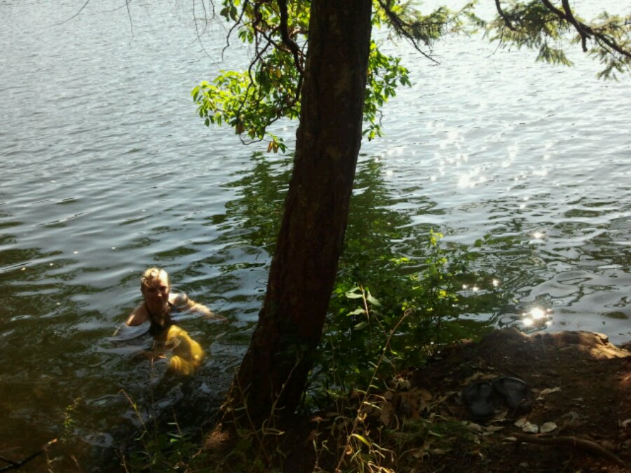 Becky Cory swims at Thetis lake in the summertime