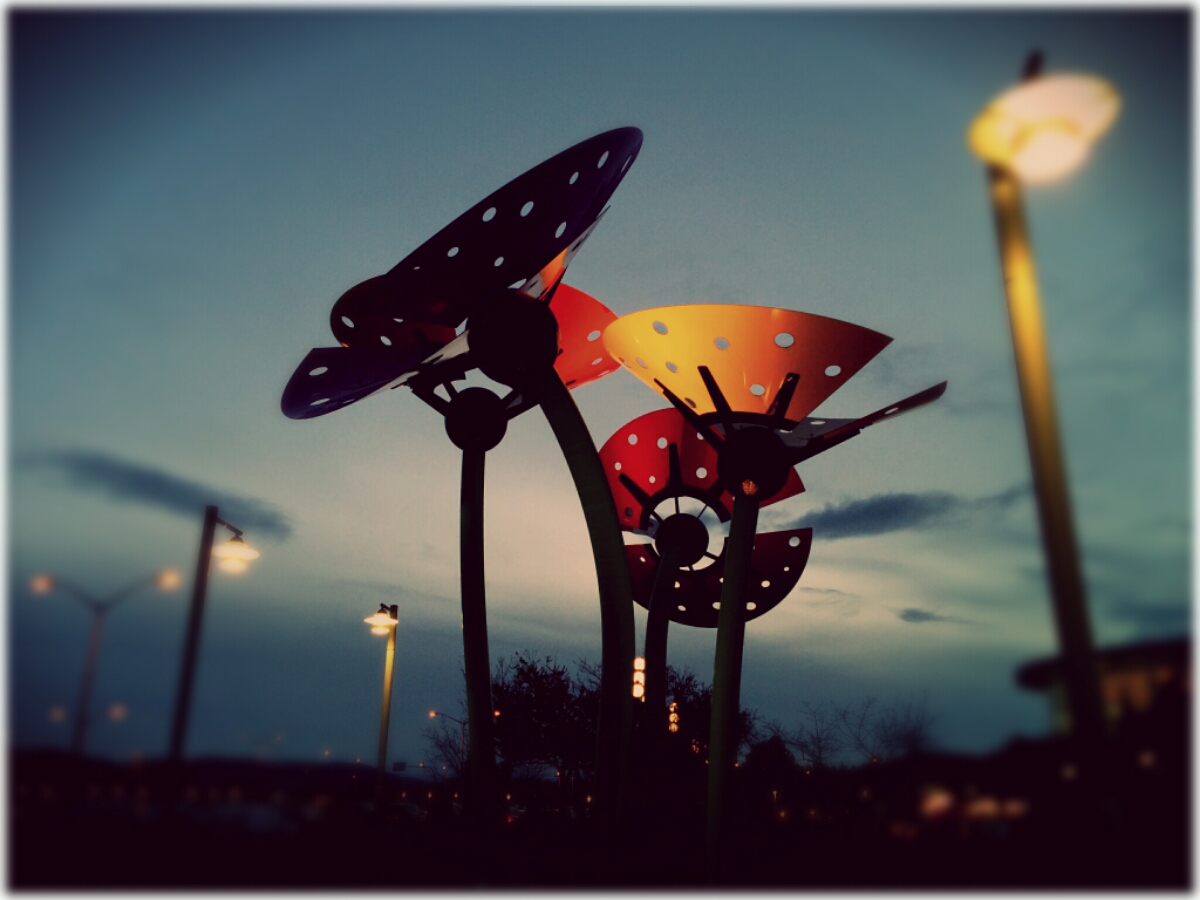 Giant metal art scuptures in the dusk light at the Victoria airport