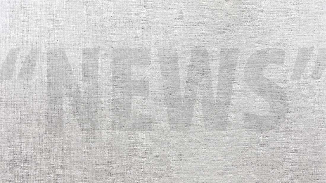 The word "news" in quote marks has been written lightly over top of a light grey textured paper.